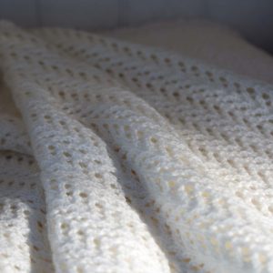 Elegant Chevron Rib Baby Blanket: Natural wool comfort for sleep and relaxation. Perfect gift for parents. Super soft, lightweight, and versatile size.